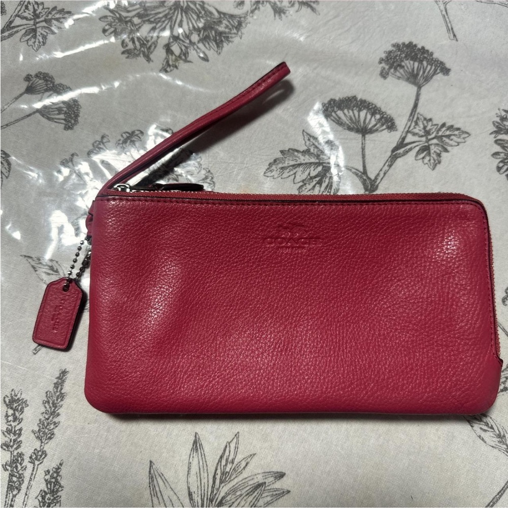 Pink leather coach wristlet